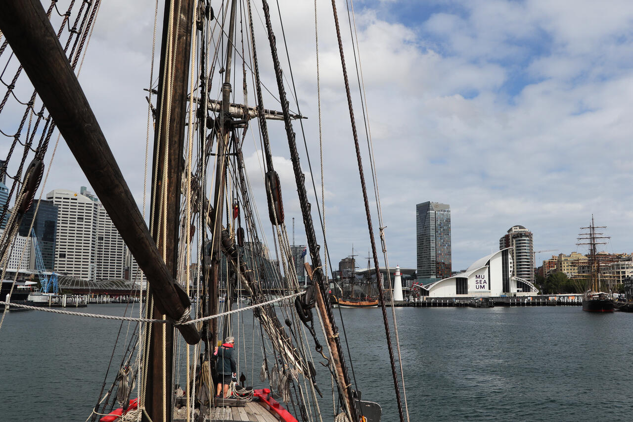 Photo onboard tall ship Duyfken with the Maritime Museum building in the background